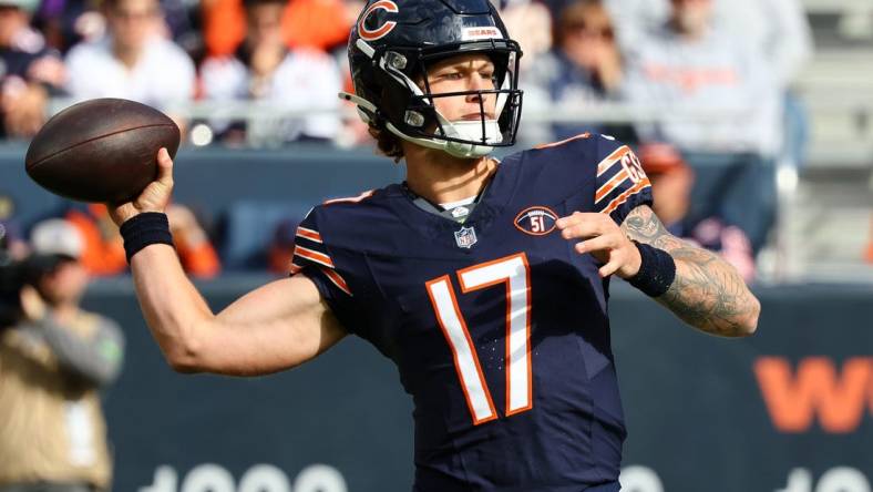 Oct 15, 2023; Chicago, Illinois, USA; Chicago Bears quarterback Tyson Bagent (17) drops back to pass against the Minnesota Vikings during the second half at Soldier Field. Mandatory Credit: Mike Dinovo-USA TODAY Sports