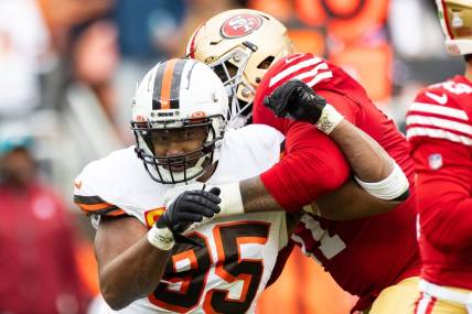 Oct 15, 2023; Cleveland, Ohio, USA; Cleveland Browns defensive end Myles Garrett (95) is blocked by San Francisco 49ers offensive tackle Trent Williams (71) during the third quarter at Cleveland Browns Stadium. Mandatory Credit: Scott Galvin-USA TODAY Sports