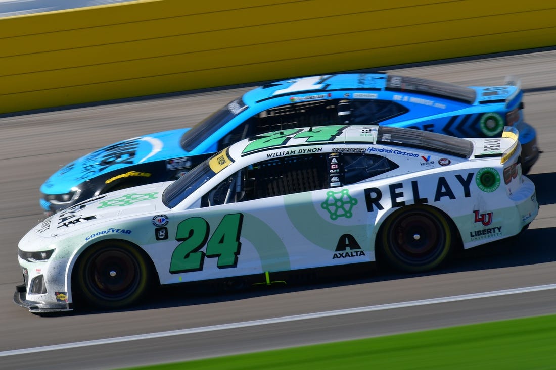 Oct 15, 2023; Las Vegas, Nevada, USA; NASCAR Cup Series driver William Byron (24) drives for position against driver Ross Chastain (1) during the South Point 400 at Las Vegas Motor Speedway. Mandatory Credit: Gary A. Vasquez-USA TODAY Sports