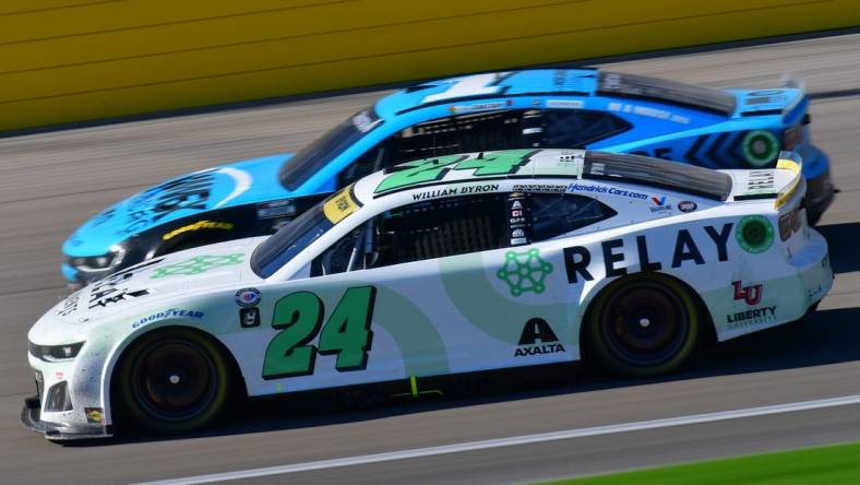 Oct 15, 2023; Las Vegas, Nevada, USA; NASCAR Cup Series driver William Byron (24) drives for position against driver Ross Chastain (1) during the South Point 400 at Las Vegas Motor Speedway. Mandatory Credit: Gary A. Vasquez-USA TODAY Sports