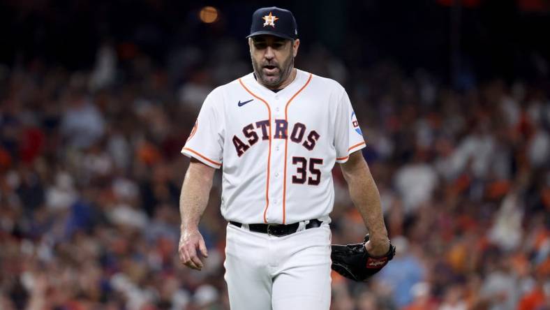 Oct 15, 2023; Houston, Texas, USA; Houston Astros pitcher Justin Verlander (35) reacts after giving up a home run to Texas Rangers center fielder Leody Taveras (not pictured) during the fifth inning of game one of the ALCS in the 2023 MLB playoffs at Minute Maid Park. Mandatory Credit: Troy Taormina-USA TODAY Sports