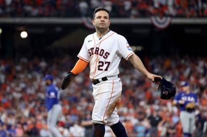 Oct 15, 2023; Houston, Texas, USA; Houston Astros second baseman Jose Altuve (27) reacts after being called out on a review during the eighth inning of game one of the ALCS against the Texas Rangers in the 2023 MLB playoffs at Minute Maid Park. Mandatory Credit: Troy Taormina-USA TODAY Sports