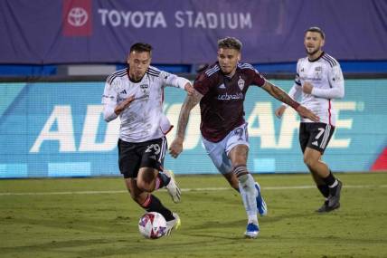 Oct 14, 2023; Frisco, TX, USA; Colorado Rapids forward Rafael Navarro (9) and FC Dallas defender Sam Junqua (29) in action in front of Advocare signage during the game between FC Dallas and the Colorado Rapids at Toyota Stadium. Mandatory Credit: Jerome Miron-USA TODAY Sports