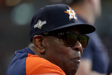 Oct 16, 2023; Houston, Texas, USA; Houston Astros manager Dusty Baker Jr. (12) looks on in the third inning against the Texas Rangers during game two of the ALCS for the 2023 MLB playoffs at Minute Maid Park. Mandatory Credit: Thomas Shea-USA TODAY Sports