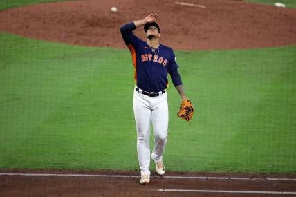 Oct 16, 2023; Houston, Texas, USA; Houston Astros relief pitcher Bryan Abreu (52) reacts in the eighth inning against the Texas Rangers during game two of the ALCS for the 2023 MLB playoffs at Minute Maid Park. Mandatory Credit: Erik Williams-USA TODAY Sports