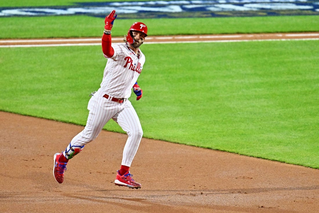 Oct 16, 2023; Philadelphia, Pennsylvania, USA; Philadelphia Phillies first baseman Bryce Harper (3) hits a solo home run during the first inning against the Arizona Diamondbacks in game one of the NLCS for the 2023 MLB playoffs at Citizens Bank Park. Mandatory Credit: Kyle Ross-USA TODAY Sports