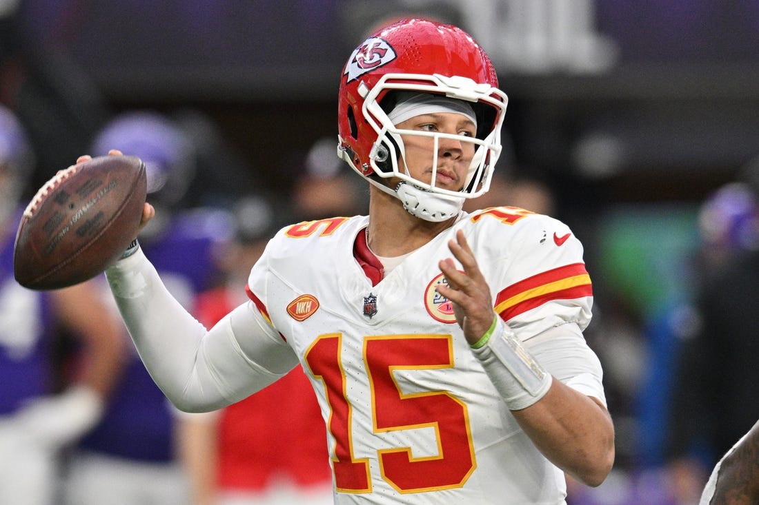 Oct 8, 2023; Minneapolis, Minnesota, USA; Kansas City Chiefs quarterback Patrick Mahomes (15) throws a pass against the Minnesota Vikings during the fourth quarter at U.S. Bank Stadium. Mandatory Credit: Jeffrey Becker-USA TODAY Sports