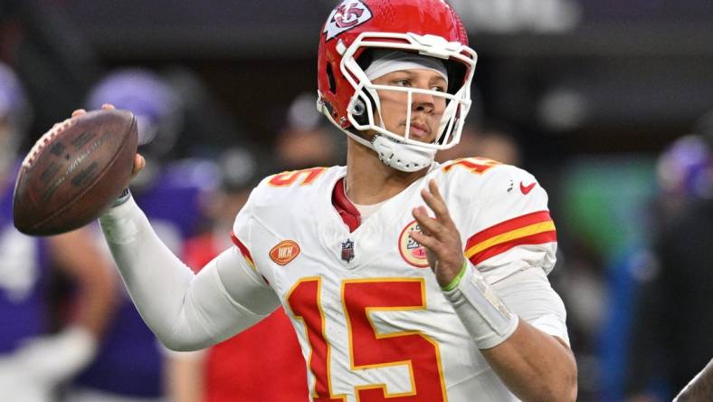 Oct 8, 2023; Minneapolis, Minnesota, USA; Kansas City Chiefs quarterback Patrick Mahomes (15) throws a pass against the Minnesota Vikings during the fourth quarter at U.S. Bank Stadium. Mandatory Credit: Jeffrey Becker-USA TODAY Sports