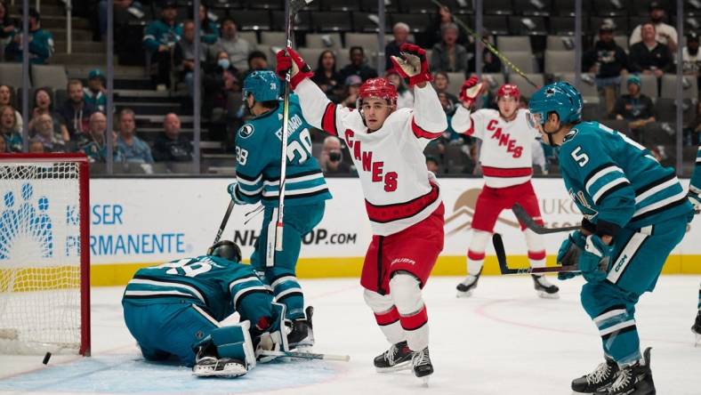 Oct 17, 2023; San Jose, California, USA; Carolina Hurricanes center Seth Jarvis (24) reacts after scoring a goal against the San Jose Sharks during the first period at SAP Center at San Jose. Mandatory Credit: Robert Edwards-USA TODAY Sports