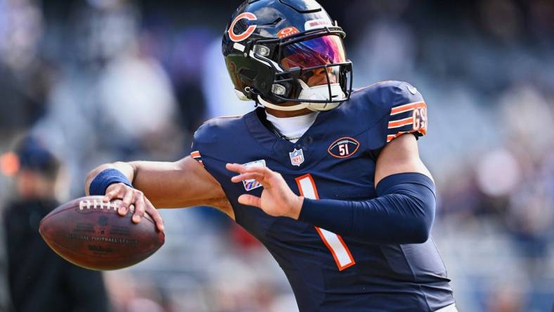 Oct 15, 2023; Chicago, Illinois, USA;  Chicago Bears quarterback Justin Fields (1) warms up before a game against the Minnesota Vikings at Soldier Field. Mandatory Credit: Jamie Sabau-USA TODAY Sports