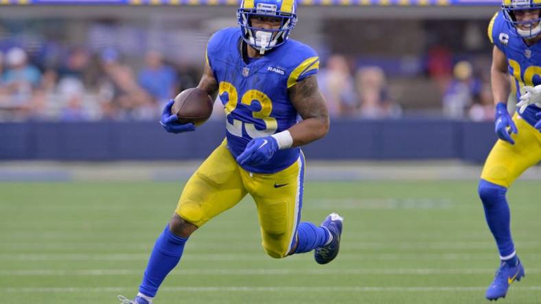 Oct 15, 2023; Inglewood, California, USA; Los Angeles Rams running back Kyren Williams (23) runs against the Arizona Cardinals during the second half at SoFi Stadium. Mandatory Credit: Alex Gallardo-USA TODAY Sports