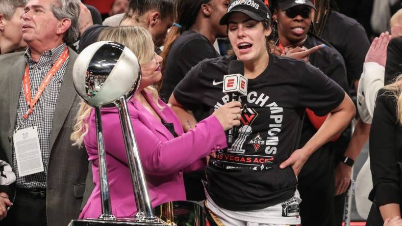 Oct 18, 2023; Brooklyn, New York, USA; Las Vegas Aces guard Kelsey Plum (10) is interviewed by ESPN reporter Holly Rowe after defeating the New York Liberty to win the 2023 WNBA Finals at Barclays Center. Mandatory Credit: Wendell Cruz-USA TODAY Sports