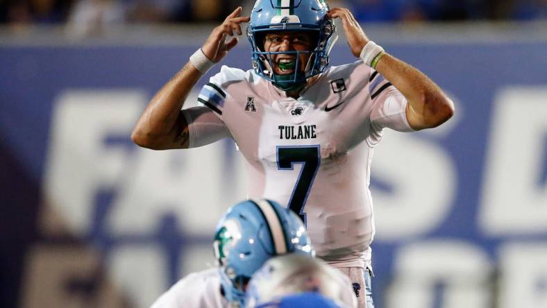 Oct 13, 2023; Memphis, Tennessee, USA; Tulane Green Wave quarterback Michael Pratt (7) signals prior to the snap against the Memphis Tigers during the first half at Simmons Bank Liberty Stadium. Mandatory Credit: Petre Thomas-USA TODAY Sports