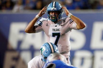 Oct 13, 2023; Memphis, Tennessee, USA; Tulane Green Wave quarterback Michael Pratt (7) signals prior to the snap against the Memphis Tigers during the first half at Simmons Bank Liberty Stadium. Mandatory Credit: Petre Thomas-USA TODAY Sports