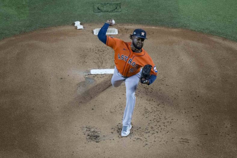 Oct 18, 2023; Arlington, Texas, USA; Houston Astros starting pitcher Cristian Javier (53) pitches during the game between the Texas Rangers and the Houston Astros during game three of the ALCS for the 2023 MLB playoffs at Globe Life Field. Mandatory Credit: Jerome Miron-USA TODAY Sports