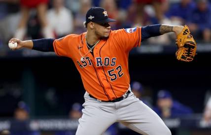 Oct 20, 2023; Arlington, Texas, USA; Houston Astros pitcher Bryan Abreu (52) throws during the eighth inning of game five in the ALCS against the Texas Rangers for the 2023 MLB playoffs at Globe Life Field. Mandatory Credit: Andrew Dieb-USA TODAY Sports