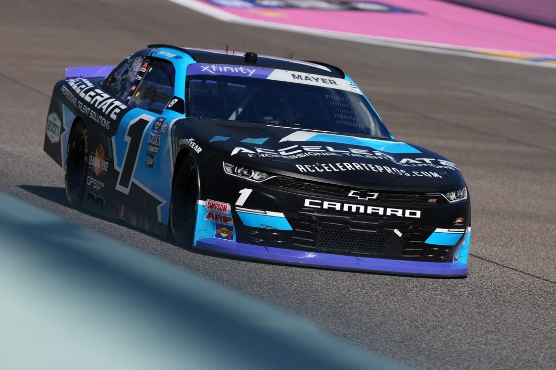 Oct 21, 2023; Homestead, Florida, USA; NASCAR Xfinity Series driver Sam Mayer (1) races during the Contender Boats 300 at Homestead-Miami Speedway. Mandatory Credit: Jasen Vinlove-USA TODAY Sports