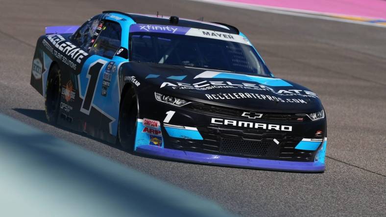 Oct 21, 2023; Homestead, Florida, USA; NASCAR Xfinity Series driver Sam Mayer (1) races during the Contender Boats 300 at Homestead-Miami Speedway. Mandatory Credit: Jasen Vinlove-USA TODAY Sports