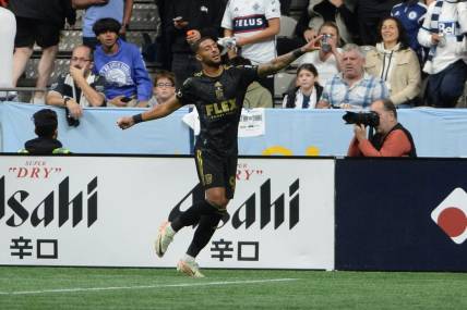 Oct 21, 2023; Vancouver, British Columbia, CAN;  Los Angeles FC forward Denis Bouanga (99) reacts after scoring against the Vancouver Whitecaps FC during the first half at BC Place. Mandatory Credit: Anne-Marie Sorvin-USA TODAY Sports