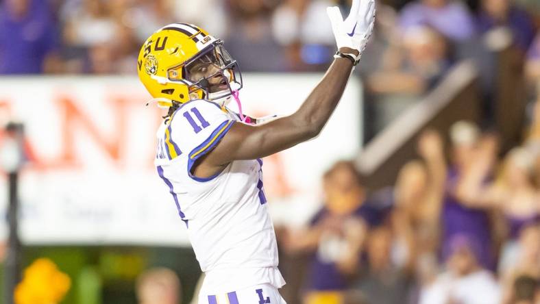 Brian Thomas Jr (11) pick six and scores a touchdown as the LSU Tigers take on the the Army Black Knights in Tiger Stadium in Baton Rouge, Louisiana, October. 21, 2023.