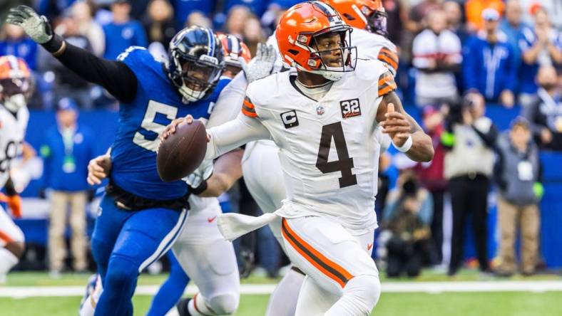 Oct 22, 2023; Indianapolis, Indiana, USA; Cleveland Browns quarterback Deshaun Watson (4) drops back to pass the ball in the first quarter against the Indianapolis Colts at Lucas Oil Stadium. Mandatory Credit: Trevor Ruszkowski-USA TODAY Sports