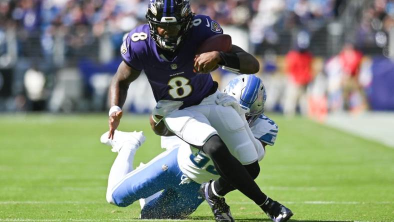 Oct 22, 2023; Baltimore, Maryland, USA;  Baltimore Ravens quarterback Lamar Jackson (8) runs of a first half first down against the Detroit Lions at M&T Bank Stadium. Mandatory Credit: Tommy Gilligan-USA TODAY Sports