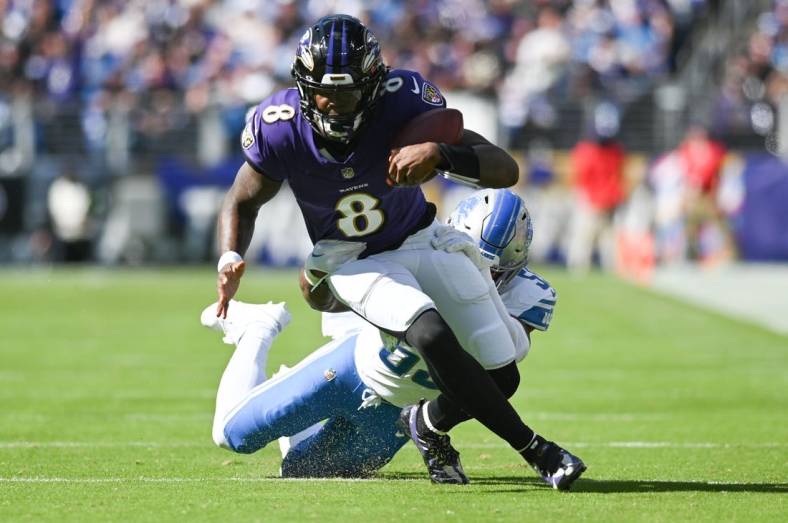 Oct 22, 2023; Baltimore, Maryland, USA;  Baltimore Ravens quarterback Lamar Jackson (8) runs of a first half first down against the Detroit Lions at M&T Bank Stadium. Mandatory Credit: Tommy Gilligan-USA TODAY Sports
