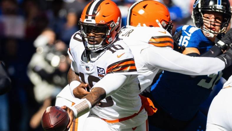 Oct 22, 2023; Indianapolis, Indiana, USA; Cleveland Browns quarterback PJ Walker (10) hands the ball off  in the second quarter against the Indianapolis Colts at Lucas Oil Stadium. Mandatory Credit: Trevor Ruszkowski-USA TODAY Sports