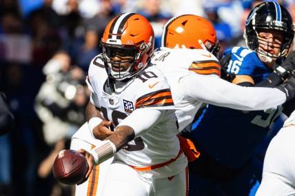 Oct 22, 2023; Indianapolis, Indiana, USA; Cleveland Browns quarterback PJ Walker (10) hands the ball off  in the second quarter against the Indianapolis Colts at Lucas Oil Stadium. Mandatory Credit: Trevor Ruszkowski-USA TODAY Sports