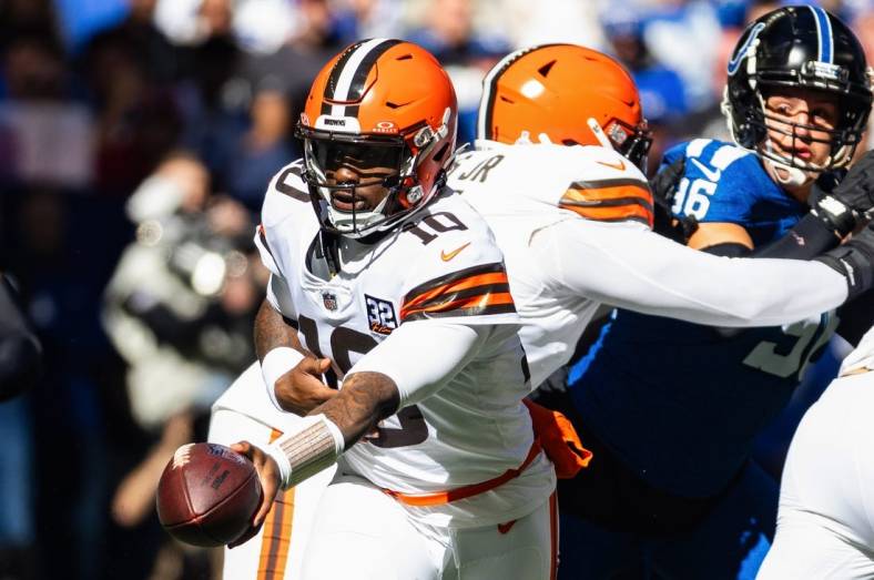Oct 22, 2023; Indianapolis, Indiana, USA; Cleveland Browns quarterback PJ Walker (10) hands the ball off  in the second quarter against the Indianapolis Colts at Lucas Oil Stadium. Mandatory Credit: Trevor Ruszkowski-USA TODAY Sports