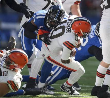 Oct 22, 2023; Indianapolis, Indiana, USA; Indianapolis Colts cornerback Kenny Moore II (23) sacks Cleveland Browns quarterback PJ Walker (10)  during a game at Lucas Oil Stadium at Lucas Oil Stadium. Mandatory Credit: Bob Scheer-USA TODAY Sports