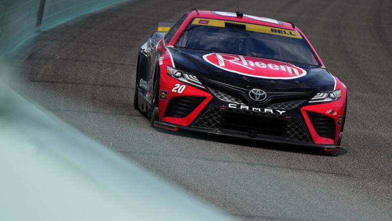 Oct 22, 2023; Homestead, Florida, USA; NASCAR Cup Series driver Christopher Bell (20) races during the 4EVER 400 presented by Mobil 1 at Homestead-Miami Speedway. Mandatory Credit: Jasen Vinlove-USA TODAY Sports