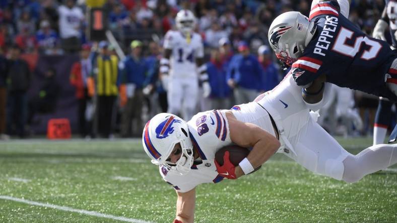 Oct 22, 2023; Foxborough, Massachusetts, USA;  New England Patriots safety Jabrill Peppers (5) tackles Buffalo Bills tight end Dawson Knox (88) during the second half at Gillette Stadium. Mandatory Credit: Bob DeChiara-USA TODAY Sports