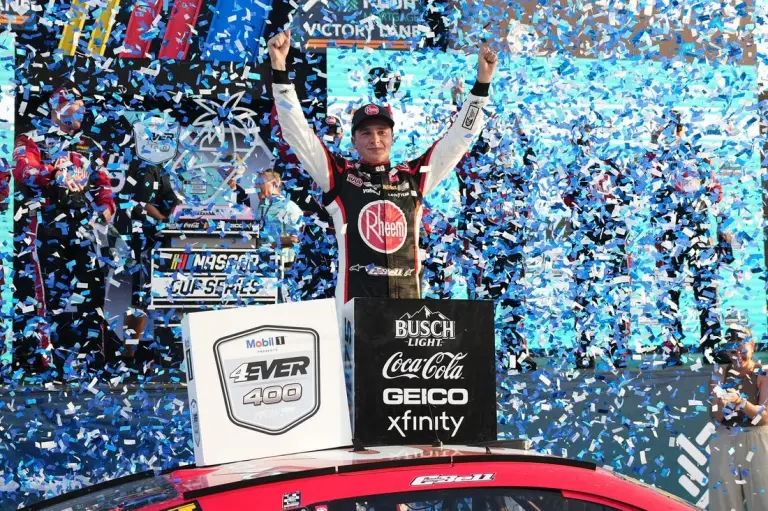 Oct 22, 2023; Homestead, Florida, USA; NASCAR Cup Series driver Christopher Bell (20) celebrates in victory lane after winning the 4EVER 400 presented by Mobil 1 at Homestead-Miami Speedway. Mandatory Credit: Jasen Vinlove-USA TODAY Sports