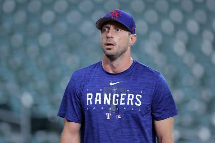 Oct 22, 2023; Houston, Texas, USA; Texas Rangers starting pitcher Max Scherzer (31) practices before game six of the ALCS for the 2023 MLB playoffs against the Houston Astros at Minute Maid Park. Mandatory Credit: Erik Williams-USA TODAY Sports