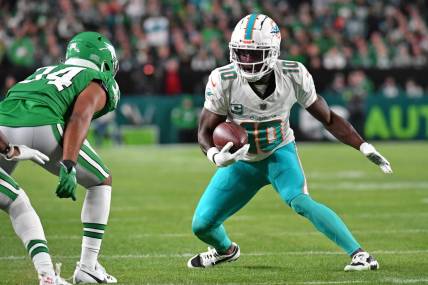 Oct 22, 2023; Philadelphia, Pennsylvania, USA; Miami Dolphins wide receiver Tyreek Hill (10) is stopped  by Philadelphia Eagles cornerback Josiah Scott (34) first quarter at Lincoln Financial Field. Mandatory Credit: Eric Hartline-USA TODAY Sports