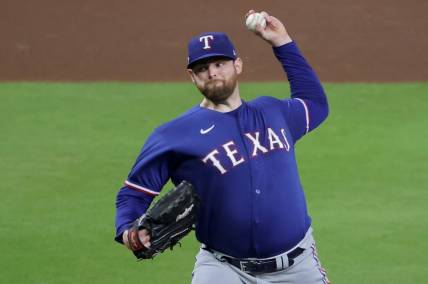 Oct 23, 2023; Houston, Texas, USA; Texas Rangers pitcher Jordan Montgomery (52) throws during the fifth inning of game seven in the ALCS against the Houston Astros for the 2023 MLB playoffs at Minute Maid Park. Mandatory Credit: Erik Williams-USA TODAY Sports