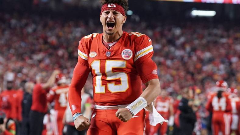 Oct 12, 2023; Kansas City, Missouri, USA; Kansas City Chiefs quarterback Patrick Mahomes (15) celebrates against the Denver Broncos toward fans game prior to a game at GEHA Field at Arrowhead Stadium. Mandatory Credit: Denny Medley-USA TODAY Sports