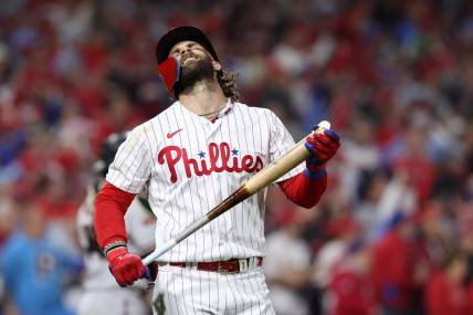 Oct 24, 2023; Philadelphia, Pennsylvania, USA; Philadelphia Phillies designated hitter Bryce Harper (3) reacts after making an out against the Arizona Diamondbacks in the fifth inning for game seven of the NLCS for the 2023 MLB playoffs at Citizens Bank Park. Mandatory Credit: Bill Streicher-USA TODAY Sports
