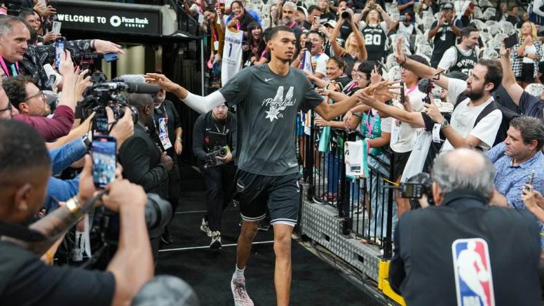 Oct 25, 2023; San Antonio, Texas, USA; San Antonio Spurs center Victor Wembanyama (1) enters the court before the game against the Dallas Mavericks at the Frost Bank Center. Mandatory Credit: Daniel Dunn-USA TODAY Sports