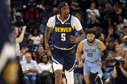 Oct 27, 2023; Memphis, Tennessee, USA; Denver Nuggets guard Kentavious Caldwell-Pope (5) reacts after a three point basket during the second half against the Memphis Grizzlies at FedExForum. Mandatory Credit: Petre Thomas-USA TODAY Sports