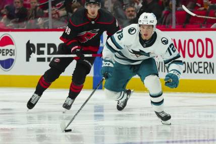Oct 27, 2023; Raleigh, North Carolina, USA; San Jose Sharks center William Eklund (72) skates with the puck against the Carolina Hurricanes during the second period at PNC Arena. Mandatory Credit: James Guillory-USA TODAY Sports