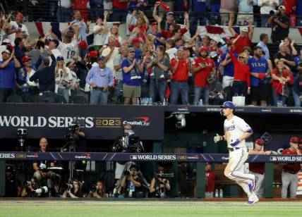Oct 27, 2023; Arlington, TX, USA; Texas Rangers shortstop Corey Seager (5) rounds the bases after hitting a two-run home run during the ninth inning in game one of the 2023 World Series against the Arizona Diamondbacks at Globe Life Field. Mandatory Credit: Kevin Jairaj-USA TODAY Sports