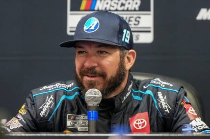 Oct 28, 2023; Martinsville, Virginia, USA; NASCAR Cup Series driver Martin Truex Jr. (19) addresses the media at Martinsville Speedway. Mandatory Credit: David Yeazell-USA TODAY Sports