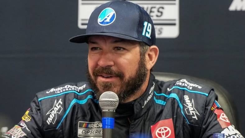 Oct 28, 2023; Martinsville, Virginia, USA; NASCAR Cup Series driver Martin Truex Jr. (19) addresses the media at Martinsville Speedway. Mandatory Credit: David Yeazell-USA TODAY Sports