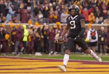 Oct 28, 2023; Minneapolis, Minnesota, USA; Minnesota Golden Gophers wide receiver Daniel Jackson (9) scores a touchdown on a 22-yard pass reception against the Michigan State Spartans during the second quarter at Huntington Bank Stadium. Mandatory Credit: Nick Wosika-USA TODAY Sports
