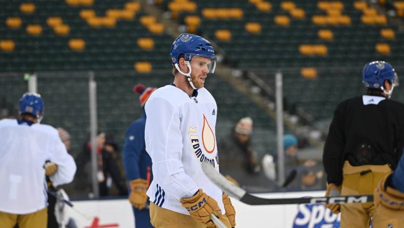 Oct 28, 2023; Edmonton, Alberta, Canada; EEdmonton Oilers centre Connor McDavid (97) hits the ice during practice day for the 2023 Heritage Classic ice hockey game at Commonwealth Stadium. Mandatory Credit: Walter Tychnowicz-USA TODAY Sports