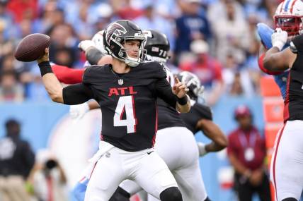 Oct 29, 2023; Nashville, Tennessee, USA; Atlanta Falcons quarterback Taylor Heinicke (4) stands in the pocket against the Tennessee Titans during the second half at Nissan Stadium. Mandatory Credit: Steve Roberts-USA TODAY Sports