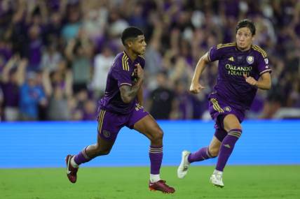 Oct 30, 2023; Orlando, Florida, USA; Orlando City midfielder Wilder Cartagena (16) celebrates a goal in the first half against the Nashville SC of game one in a round one match of the 2023 MLS Cup Playoffs at Exploria Stadium. Mandatory Credit: Nathan Ray Seebeck-USA TODAY Sports