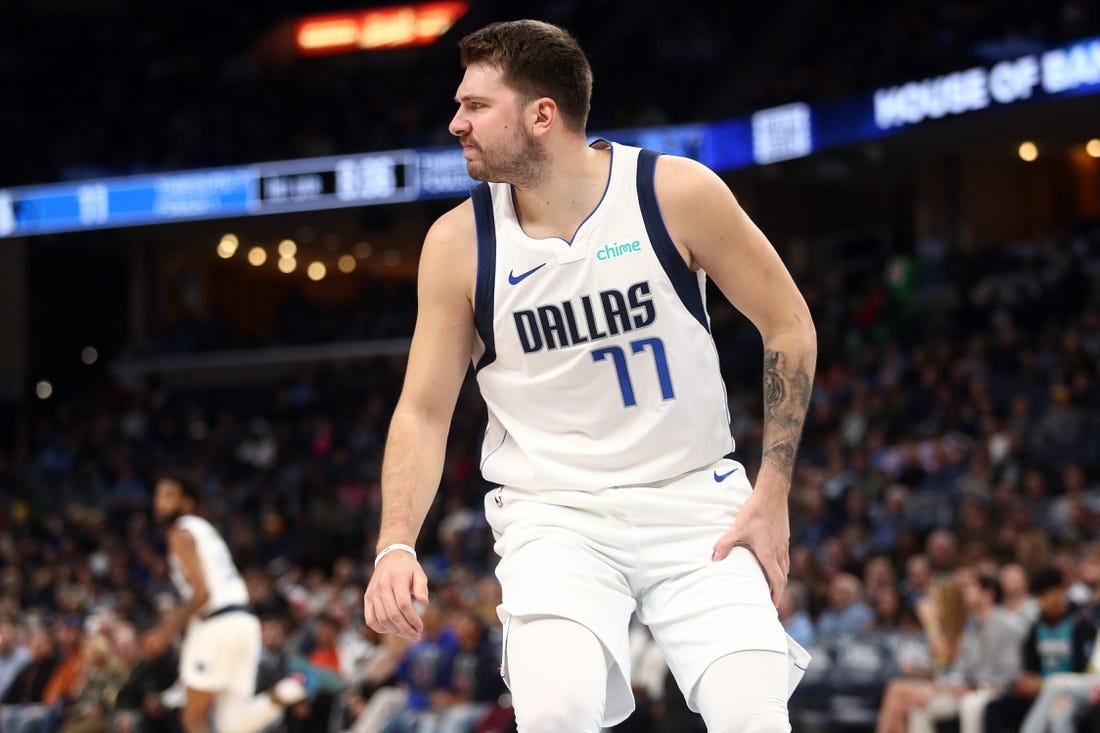 Oct 30, 2023; Memphis, Tennessee, USA; Dallas Mavericks guard Luka Doncic (77) reacts after being knocked down during the first half against the Memphis Grizzlies at FedExForum. Mandatory Credit: Petre Thomas-USA TODAY Sports